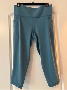 Athleta Teal Capri Leggings with Side Pockets